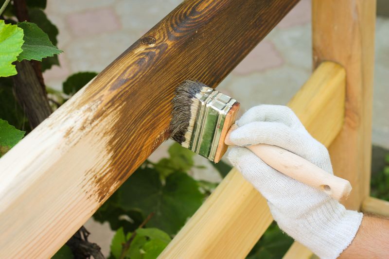 Applying Fence Stain
