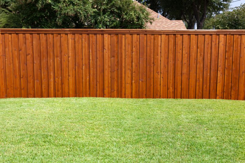 Extend Your Fence's Lifespan With Professional Fence Staining Service!